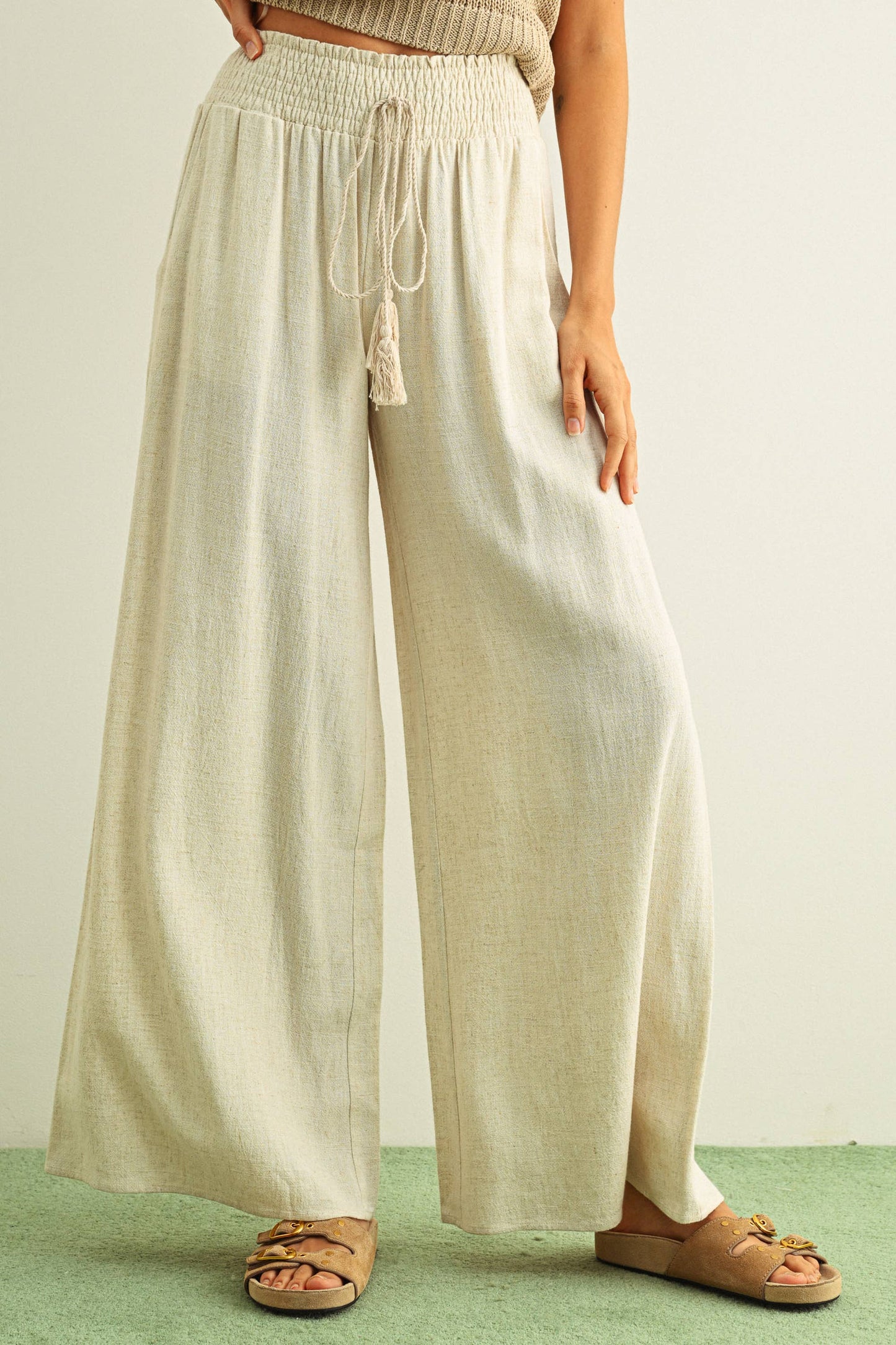 COTTON LINEN SMOCKED WAIST PANTS WITH TASSEL