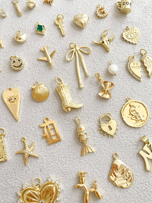 ASSORTMENT OF SMALL CHARMS
